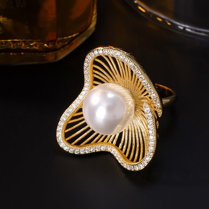 Lotusdesign funkelnde Perlenohrringe und Ringe